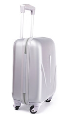 Suitcase isolated on white. Silver travel baggage bag or plastic luggage on white background. Summer vacation and product advertisement concept.