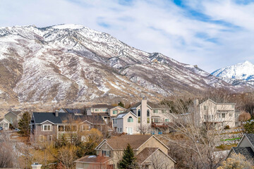 Snowy mountain and houses on a Utah Valley neighborhood landscape in winter