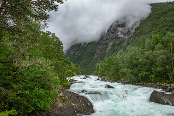 Fototapeta na wymiar River from the Husedalen waterfalls