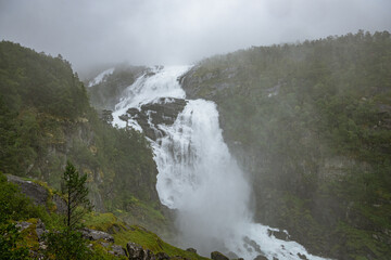 Nyastolfossen in fog from the waterfalls of Husedalen