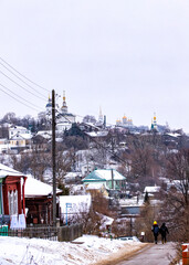 Fototapeta na wymiar View of the historical center of the city of Vladimir in winter from Krasnaya Gorka street, Russia