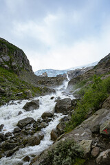 Fototapeta na wymiar Big river from the Buerbreen glacier in Norway