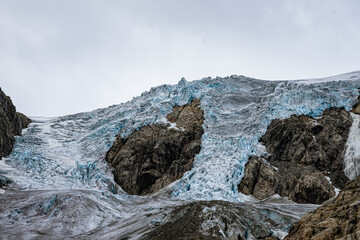 Buerbreen glacier with rocks around it