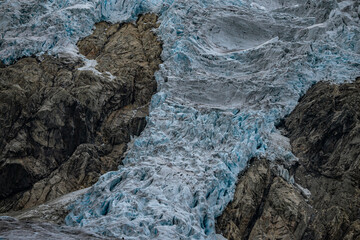 Buerbreen glacier with rocks around it