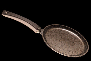 Brown frying pan with non-stick, isolated on black background