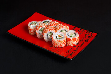 Asian cuisine dish, delicious sushi, sushi on a black background, roll you net on a black background