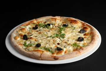 fragrant and hot pizza on a dark background