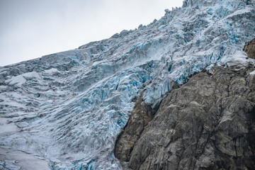 Buerbreen glacier with rocks around it