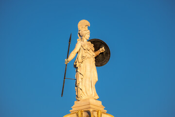Fototapeta premium Athena statue in front of Academy of Athens at Sunset, Attica, Greece