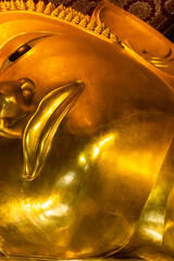 BanGKOK, THAILAND, 10 JANUARY 2020: Big golden statue of the Reclining Buddha