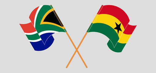 Crossed and waving flags of Republic of South Africa and Ghana