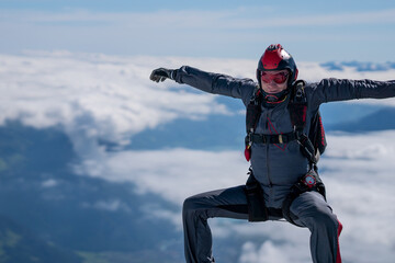 Fototapeta na wymiar Skydiver performs acrobatics mid-air