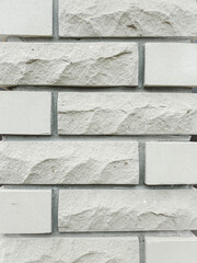 a fragment of a gray brick wall. brickwork for background or texture