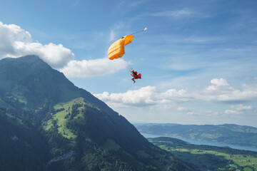 Parasailor glides over mountains