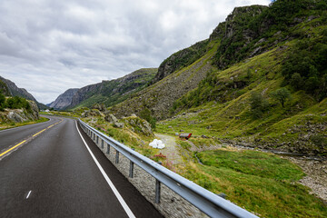 Street through a hilly landscape
