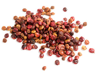 Whole Dried Sumac Berry Seed (Rhus). Isolated on White Background.