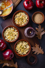 Small apple crambles or applie pies for autumn and winter