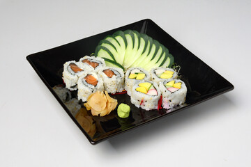 Japanese Food Sushi Set in Black Plate on the Table
