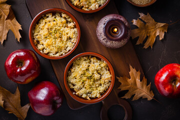 Small apple crambles or applie pies for autumn and winter