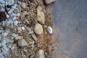 Fototapeta na wymiar Closeup on small rocks decorating a garden