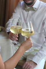 person with glass of wine