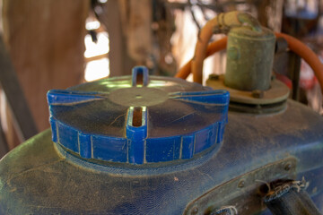 Closeup of the cap of a fertilizer tank