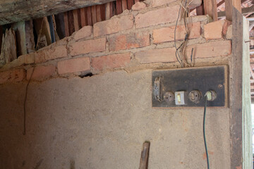 Very old electric switches and sockets of an old farm