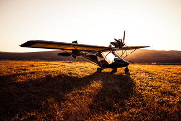 Fototapeta premium hang glider at sunset