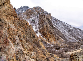 Fototapeta na wymiar Magnificent rocky mountain in Provo Canyon Utah dusted with snow in winter