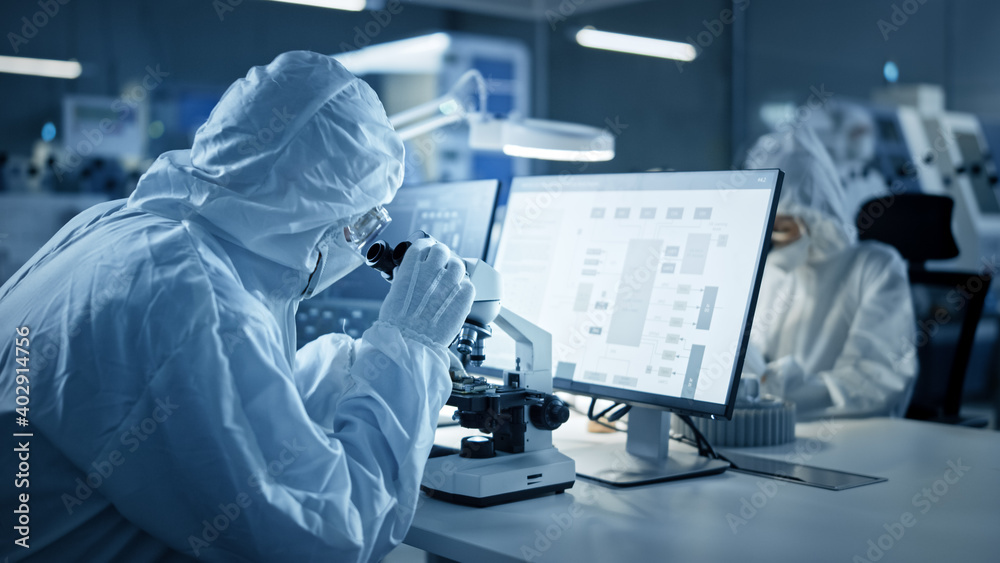 Poster Research Factory Cleanroom: Team of Engineers and Scientists in Coveralls Work on Computers, Use Microscope to Inspect Motherboard Microprocessor, Developing Electronics for Medical Electronics