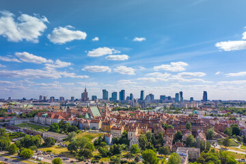 Aerial panorama of Warsaw, Poland  over the Vistual river and City center in a distance - obrazy, fototapety, plakaty