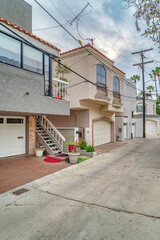 Fototapeta na wymiar Homes with attached garages and balconies in Long Beach California neighborhood