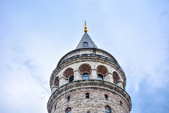 Famous historical and tourist place Galata tower in Istanbul, Turkey with blue sky background