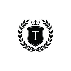 Obraz premium Letter T laurel wreath template logo Luxury shield letter with crown. Monogram alphabet . Beautiful royal initials letter.