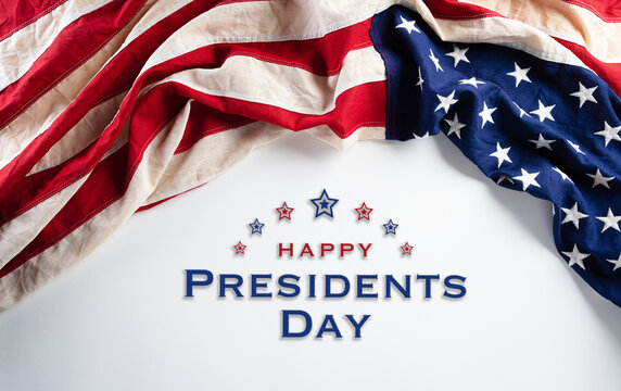 Happy presidents day concept with flag of the United States on white background.