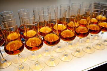 A lot of glasses with cognac