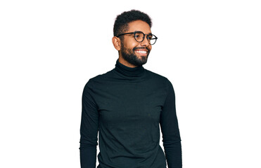 Fototapeta premium Young african american man wearing casual clothes looking away to side with smile on face, natural expression. laughing confident.