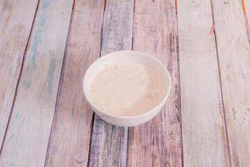 bowl of salad dressing sauce
