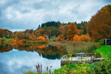 Autumn landscape with lake and trees