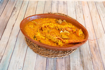 clay tray with rice with lobster