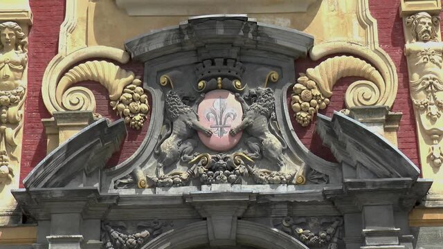 Architectural elements: Coat of Arms at the Old Stock Exchange, Vieille Bourse de Lille building in Old Town Lille, France.