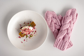 mitten, cake on white wooden table