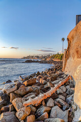 San Diego California coastline with huge rocks and land bordered by the ocean