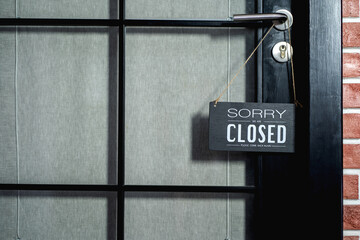 Sorry we're closed sign. Business office or store shop is closed,