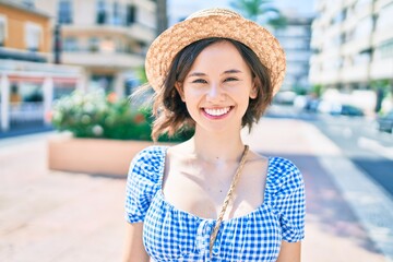 Young beautiful girl smiling happy walking at street of city