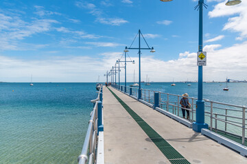 Obraz premium Rockingham foreshore jetty in front of the Cruising Yacht Club.