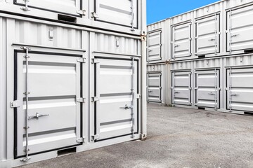 Stack of container shipping at dockyard in the port industrial area