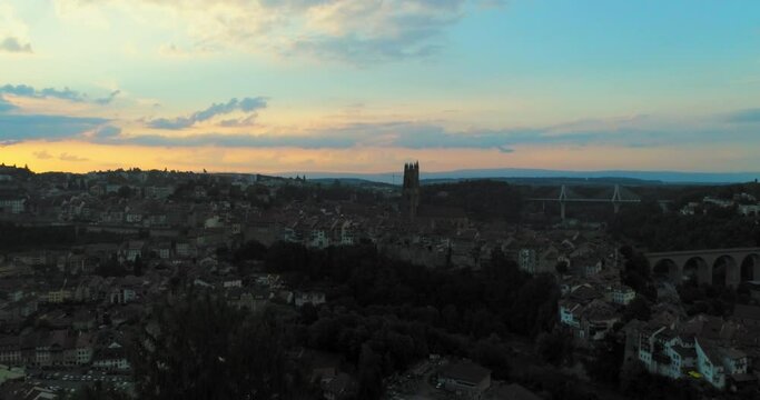 Drone aerial fribourg switzerland village and city summer sunset