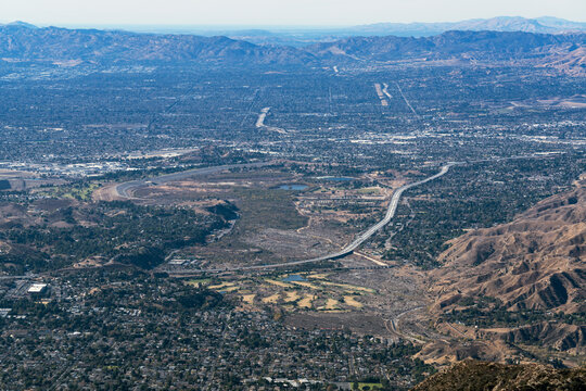 Aerial view towards Hansen Dam, Lakeview Terrace, Pacoima and Mission Hills in the San Fernando Valley area of Los Angeles California.  