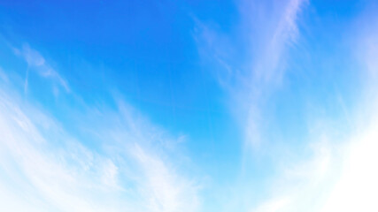 Air clouds in the blue sky panorama abstract style.